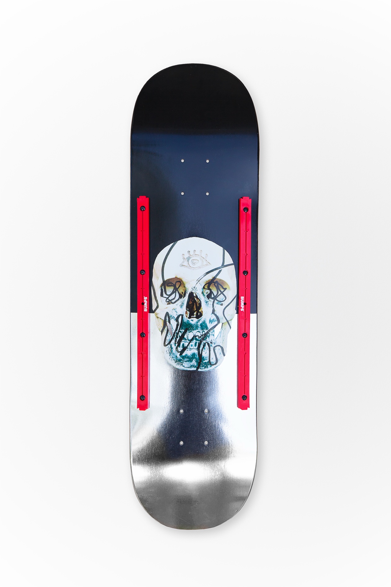 Red BUMPS rails mounted on a skull graphic deck